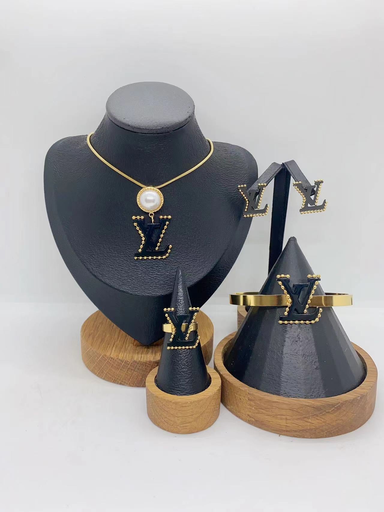 Luxury Gold Pendant Jewelry Set with Black Accent – Necklace, Earrings, Bracelet & Ring
