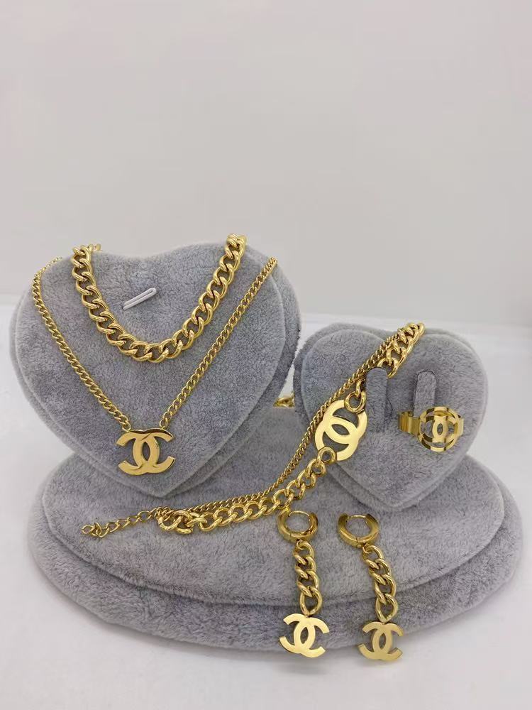 Luxury Gold Charm Jewelry Set – Necklace, Bracelet, Earrings & Ring