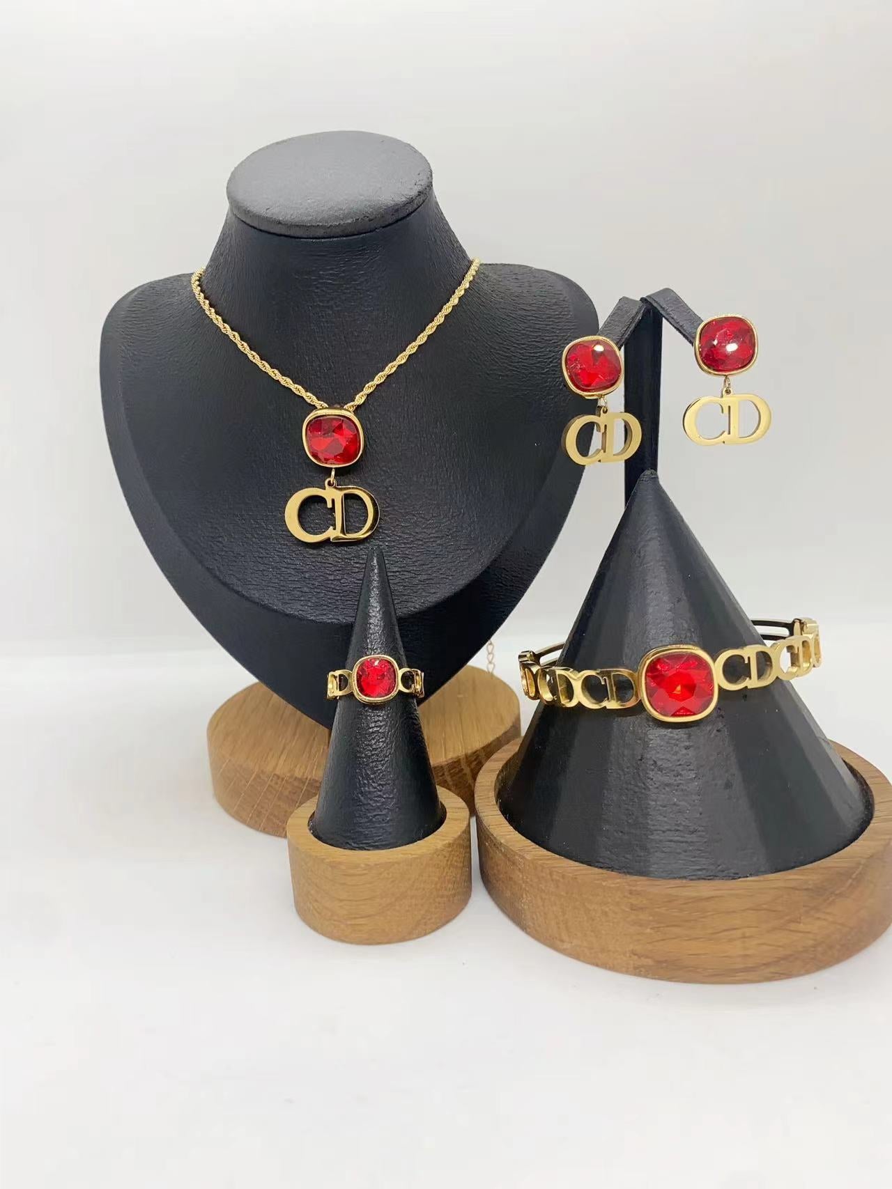 Elegant Gold Crystal Letter Charm Jewelry Set – Necklace, Earrings, Bracelet & Ring