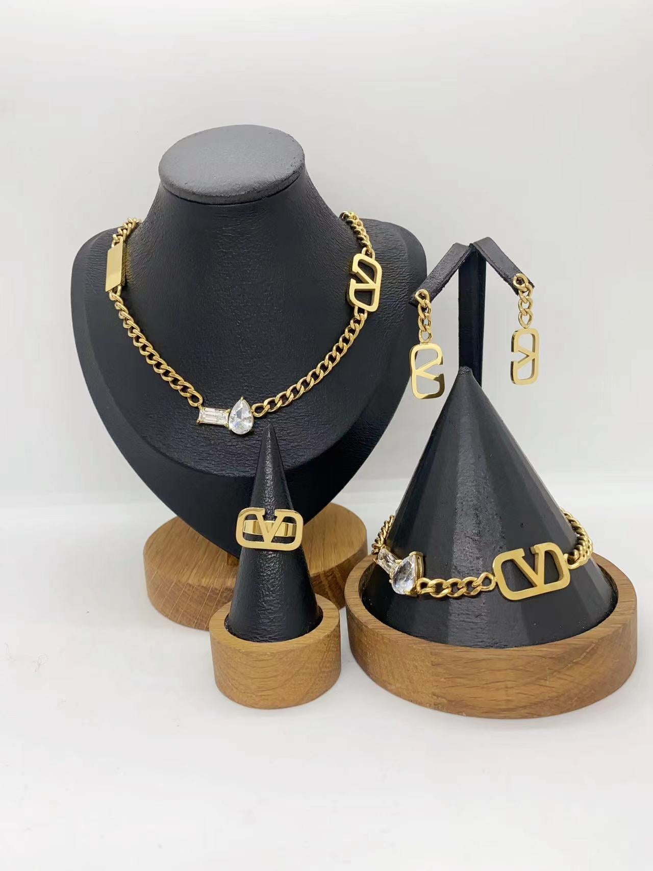 Luxury Gold Heart Link Jewelry Set – Necklace, Bracelet, Ring & Earrings